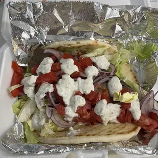 HUGE Gyro to go, came with an excellent dill sauce!