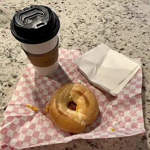 Fried egg and cheese bagel with a white mocha raspberry latte.