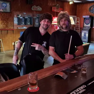 two men at a pool table