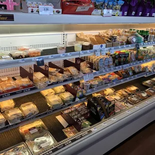 Fruit, sushi, cold sandwiches, Chinese food, fruit, pudding, cheese, and more.