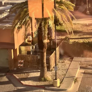 Homeless building a house in the parking lot.