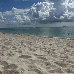 a view of the ocean from a beach umbrella