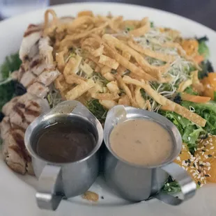 Asian chicken salad with side of tiger sauce