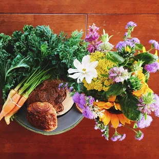 Fresh flowers, blue oven bakery, organic veggies...great haul from the farmers market!