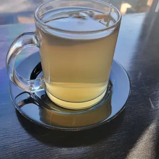 a cup of tea on a saucer