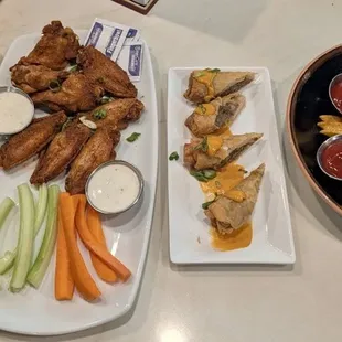 Beef sliders, Old Bay wings, Philly Cheesesteak Eggrolls, waffle fries