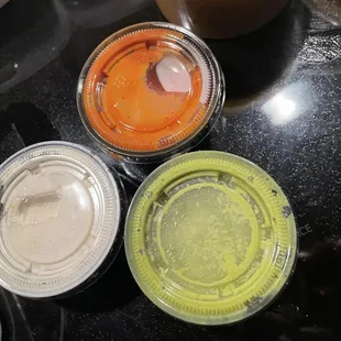 Sauces that accompany.  No idea what they are but the white one is hot!!  Green and white together is good.