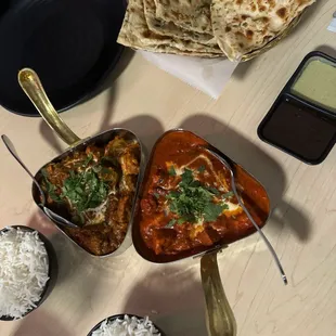a variety of dishes of food on a table