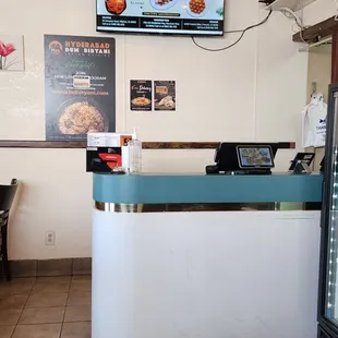 a view of a restaurant counter
