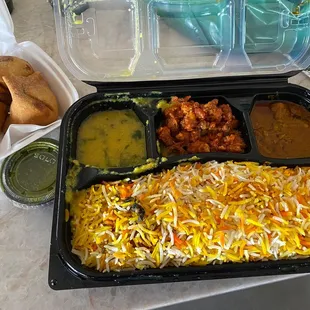 The Chicken dum lunch box, and veg samosas