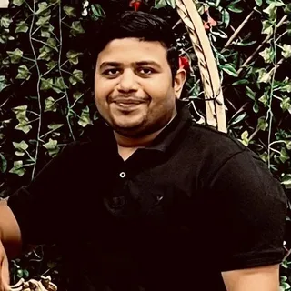 Naveen K.