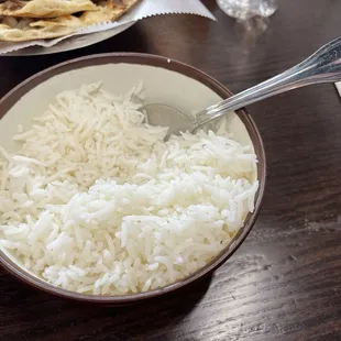 Basmati rice. Fluffy and separate grains, as it should be. Perfectly prepared and fresh.
