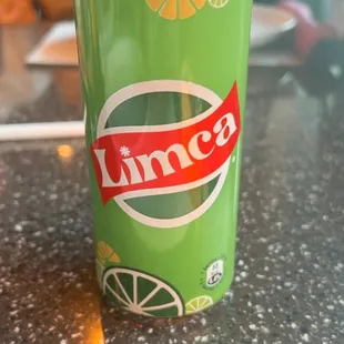 a can of soda on a table