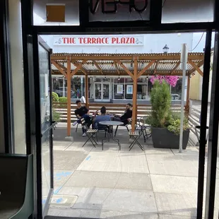 Outside seating options are cooler than sitting inside next to the kitchen.