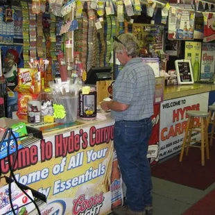 a man standing in front of a store