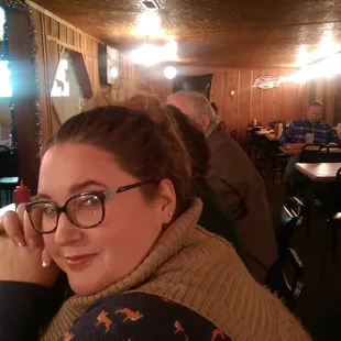 a woman sitting at a table