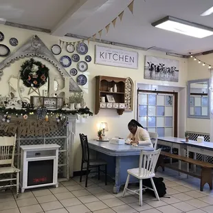 a woman sitting at a table