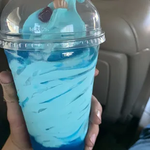 Blue raspberry slushie with blue moon ice cream