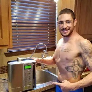 UFC Legend Diego "Nightmare" Sanchez with one of his Kangen Water machines