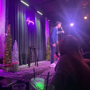 a man and woman on stage