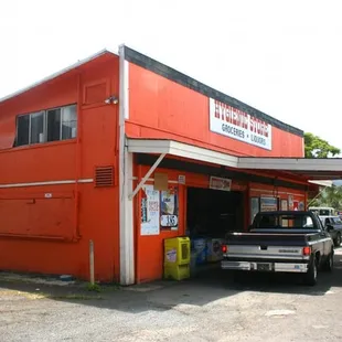 a truck parked in front of a building