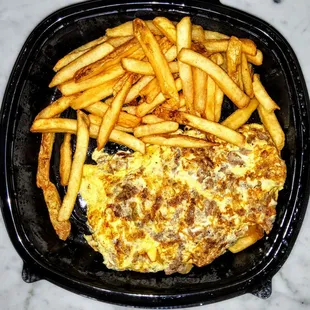 Philly Cheesesteak Omelette: Thin sliced steak with American cheese, fried onions, diced and mixed with eggs. &amp; 13.95