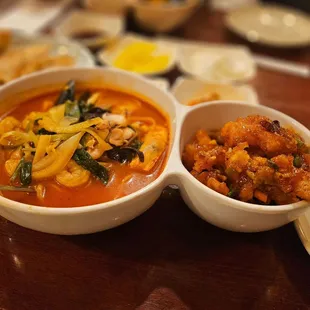two bowls of food on a table