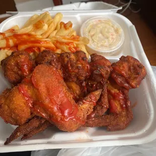 Chicken wing special. Little salt, little hot sauce, and ketchup put on by myself at the store.