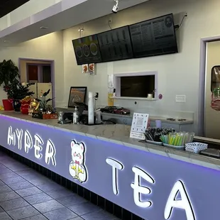 the counter area of a tea shop