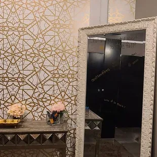 a bathroom with a sink and mirror