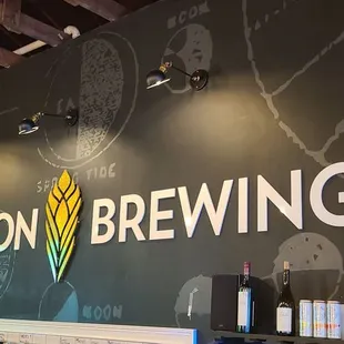 a bar with a chalkboard