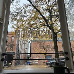 A cozy window seat on a fall day