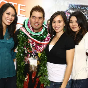 2010 RENAISSANCE.  HS4L JASON HANDS OVER THE FLAG TO BROTHER JOSHUA.  WITH HIM ARE HYPERSQUAD ALUMNI GIRLS FROM YR 2000s