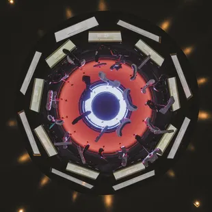 The infamous gear chandelier situated above the retro-dome!