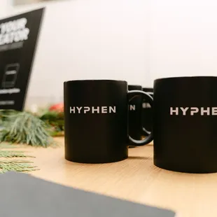 New ad agency name HYPHEN on mug