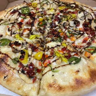 Hypnotic Balsamic starts with Roasted Garlic Sauce, Red Pepper, Jalapeño, Mushroom, Pepperoncini, Sun Dried Tomato with Rich Balsamic Spiral