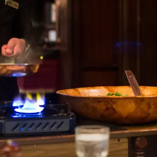 Tableside warm spinach salad
