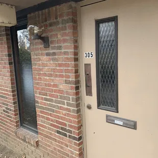 The address they gave me in writing.  A locked door with no sign.