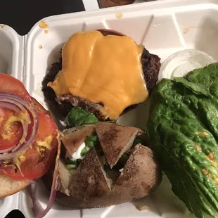 Cross cut baked potato and cheeseburger!
