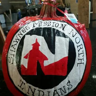 Pumpkin painted by the HyVee add creater to show support for SMN band during their fundraiser.