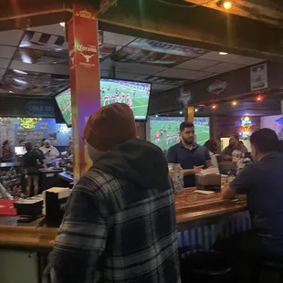 people sitting at the bar