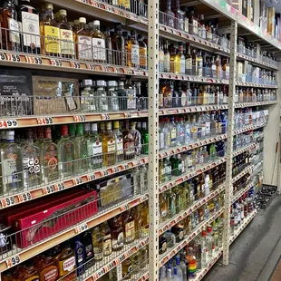 shelves of liquor in a grocery store