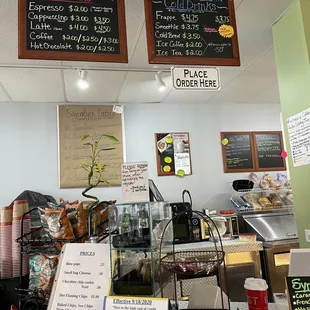 menus on the wall above the counter