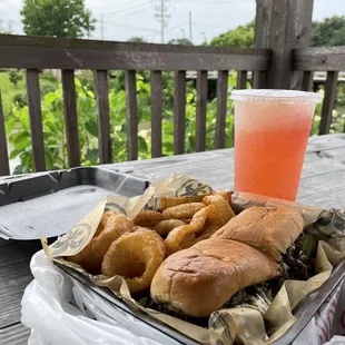 Cheesesteak , onion rongs and Strawberry lemonade.
