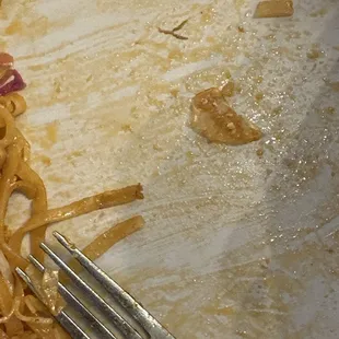 Piece of shrimp shell that was hidden in the food.