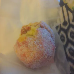 a donut covered in powdered sugar