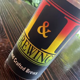 a can of beer on a table