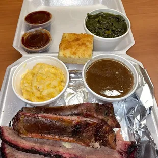 2 meat combo with ribs and brisket. Mac and cheese, bake beans, greens and cornbread
