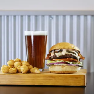 Our signature cheese curds, burger, and ice cold beer.