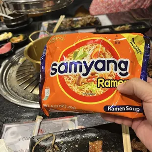 They just give you a packet of ramen and a pot of boiling water because you know what to do.